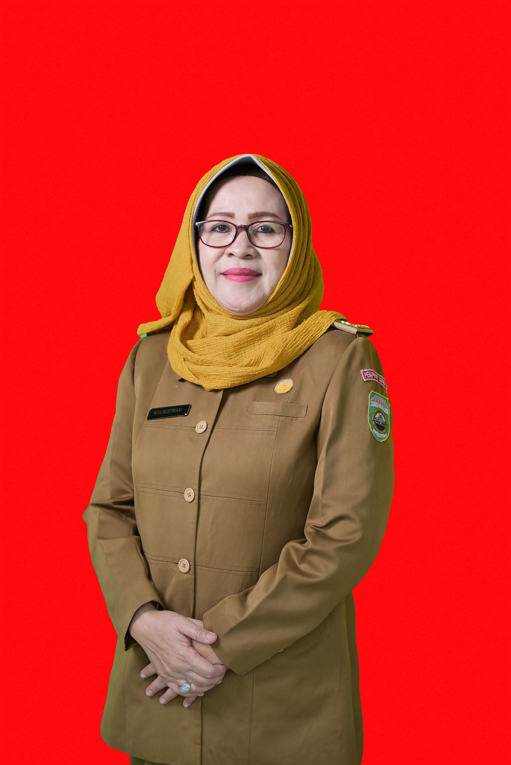 Hj. Rita Sustriani, M.Pd